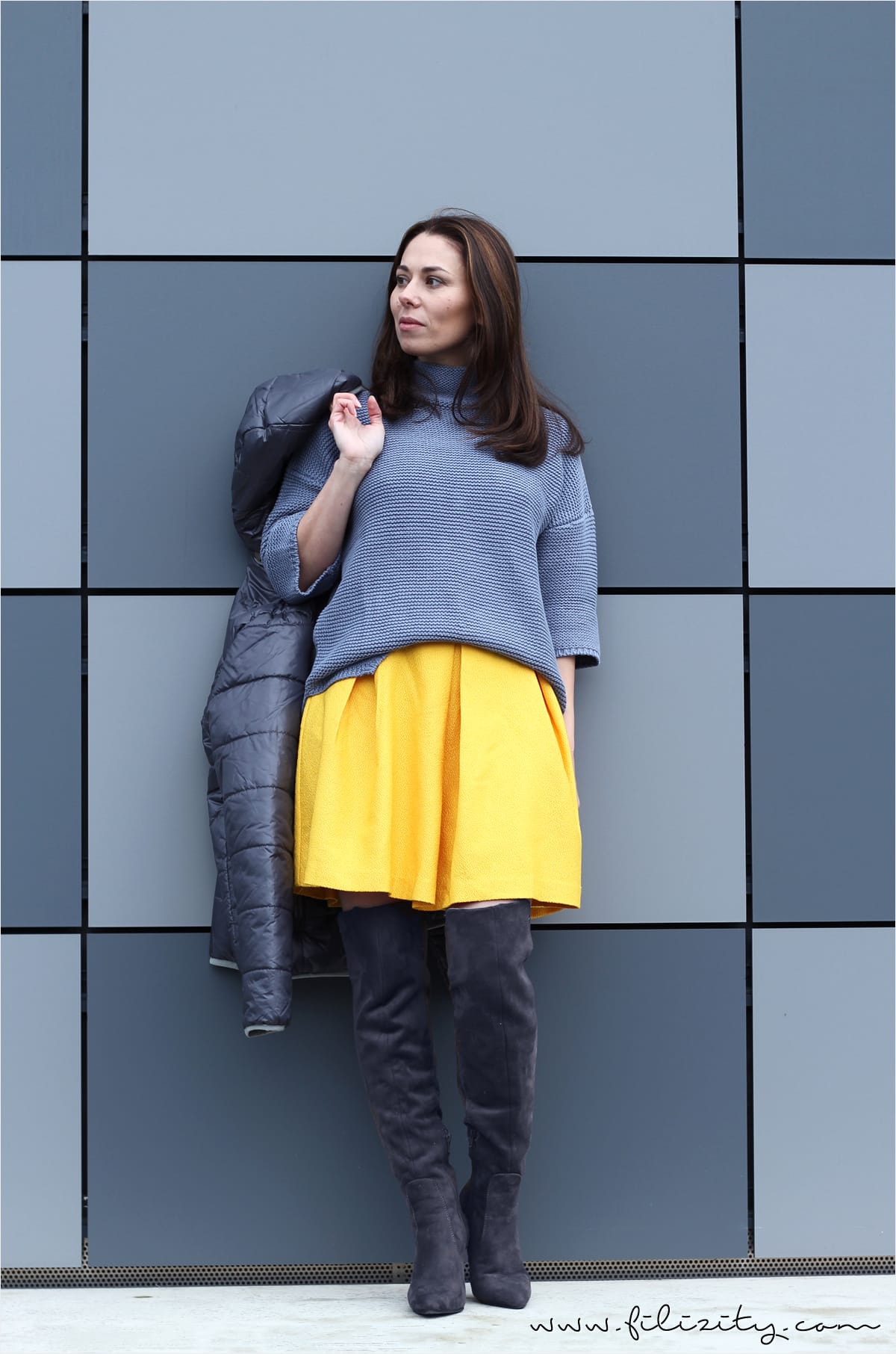 winter look with yellow skirt, overknee boots and knit sweater